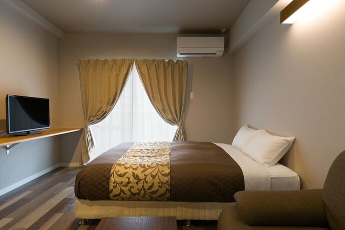 Imagen de la habitación del Hotel Mr.kinjo In Nishizaki. Foto 18