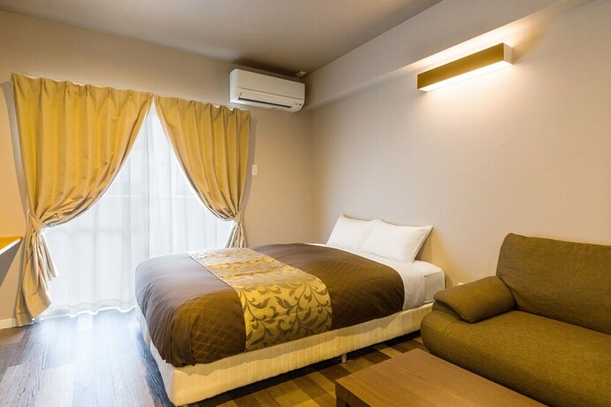 Imagen de la habitación del Hotel Mr.kinjo In Nishizaki. Foto 22