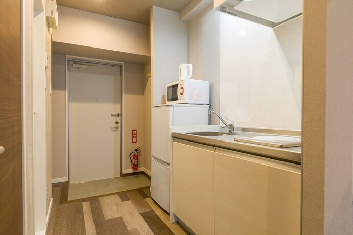 Imagen de la habitación del Hotel Mr.kinjo In Nishizaki. Foto 26