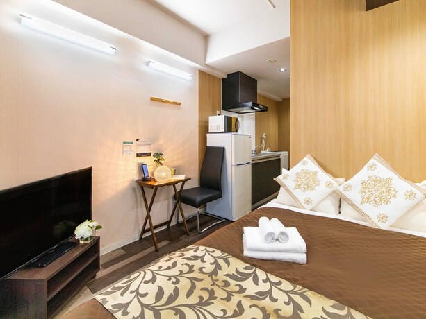 Imagen de la habitación del Hotel Mr.kinjo In Uchidomari. Foto 18