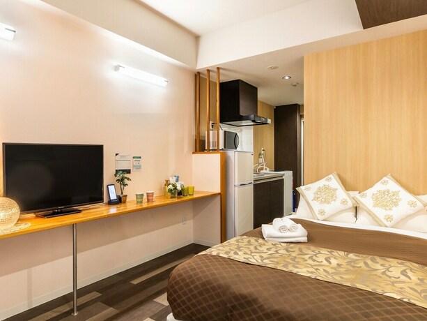 Imagen de la habitación del Hotel Mr.kinjo In Uchidomari. Foto 19