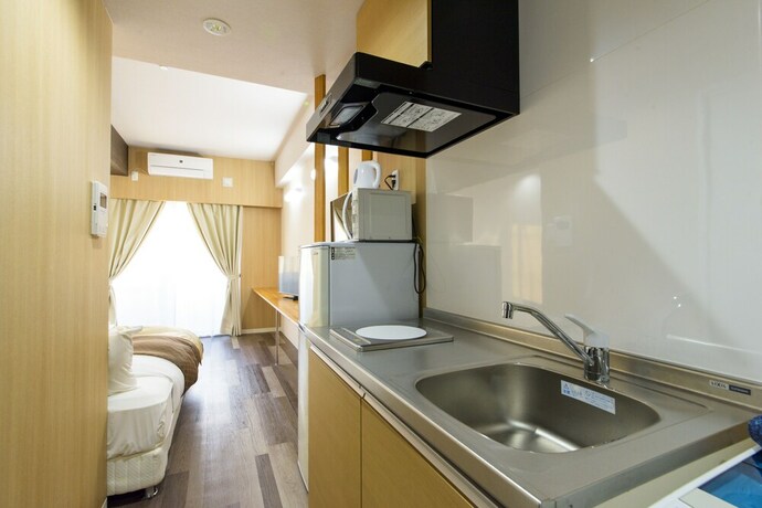 Imagen de la habitación del Hotel Mr.kinjo In Uchidomari. Foto 22
