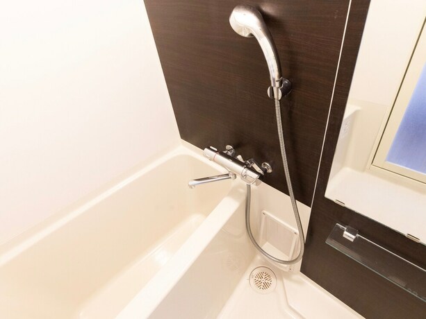 Imagen de la habitación del Hotel Mr.kinjo In Uchidomari. Foto 34