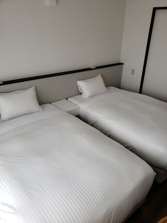 Imagen de la habitación del Hotel Mr.kinjo Mighty One Miyakojima. Foto 31
