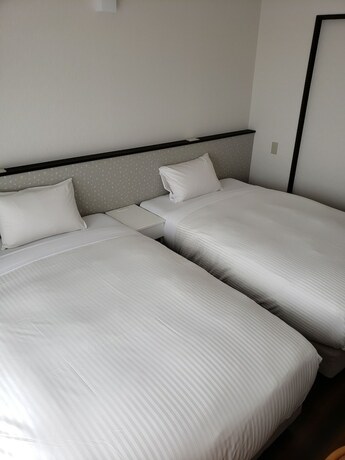 Imagen de la habitación del Hotel Mr.kinjo Mighty One Miyakojima. Foto 33
