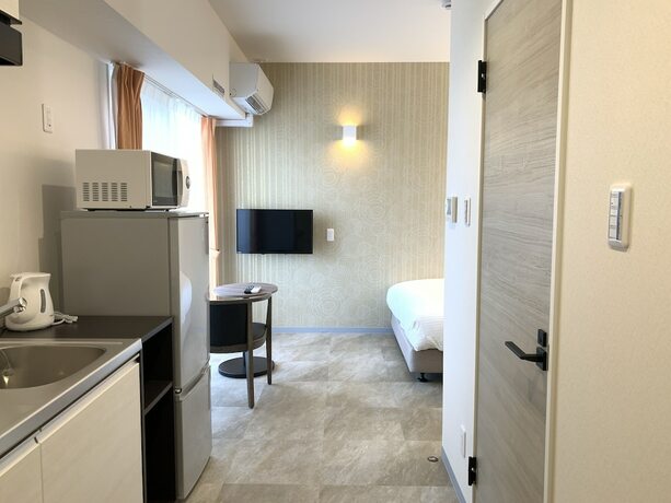Imagen de la habitación del Hotel Mr.kinjo Miki24 In Front Of Makishi Station. Foto 22