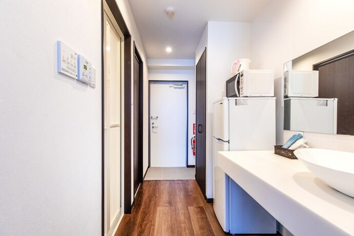 Imagen de la habitación del Hotel Mr.kinjo Miyako Island. Foto 20