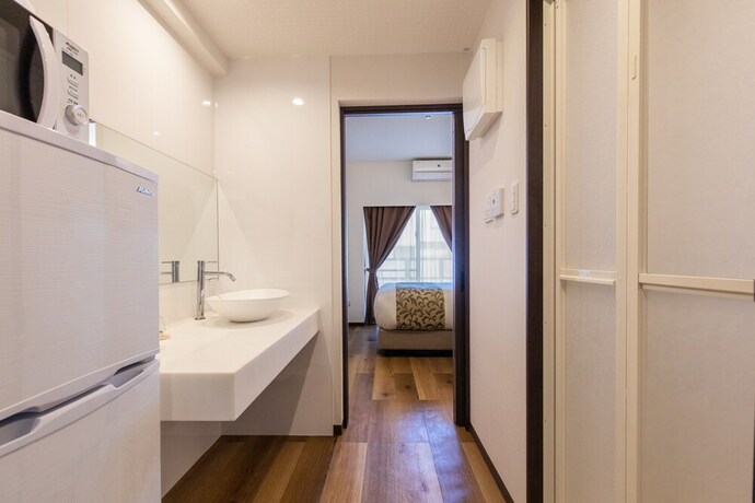 Imagen de la habitación del Hotel Mr.kinjo Miyako Island. Foto 21