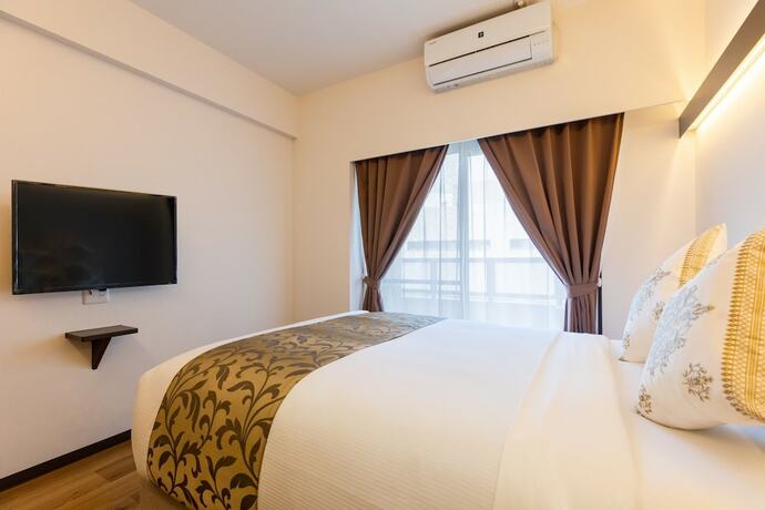 Imagen de la habitación del Hotel Mr.kinjo Miyako Island. Foto 23