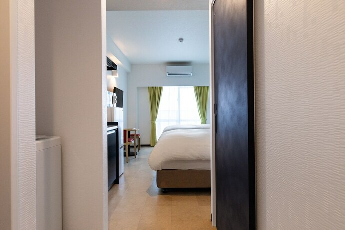 Imagen de la habitación del Hotel Mr.kinjo Miyakojima Painagama Resort. Foto 21