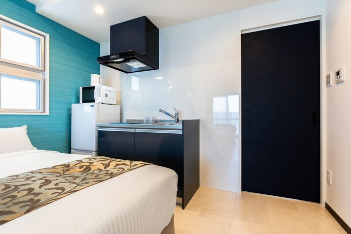 Imagen de la habitación del Hotel Mr.kinjo Miyakojima Painagama Resort. Foto 25
