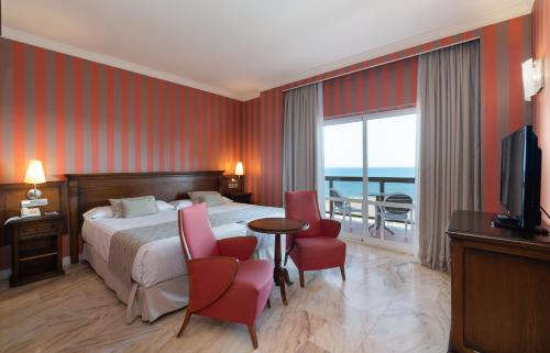 Imagen de la habitación del Hotel Ms Amaragua. Foto 10