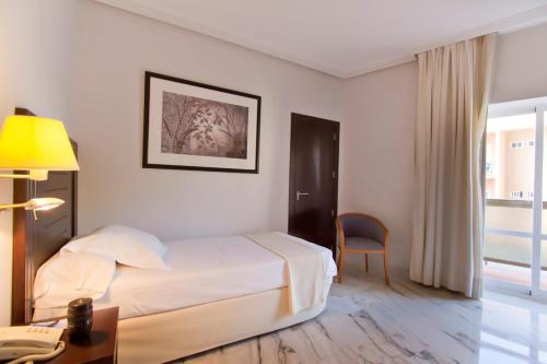 Imagen de la habitación del Hotel Ms Amaragua. Foto 15