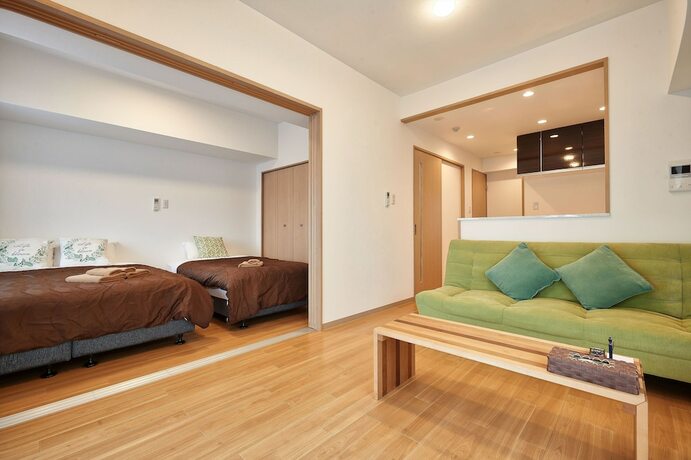 Imagen de la habitación del Hotel M's Stay Okinawa. Foto 14
