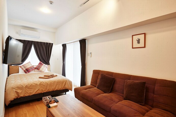 Imagen de la habitación del Hotel M's Stay Okinawa. Foto 16