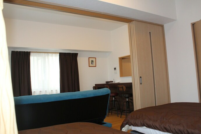 Imagen de la habitación del Hotel M's Stay Okinawa. Foto 20