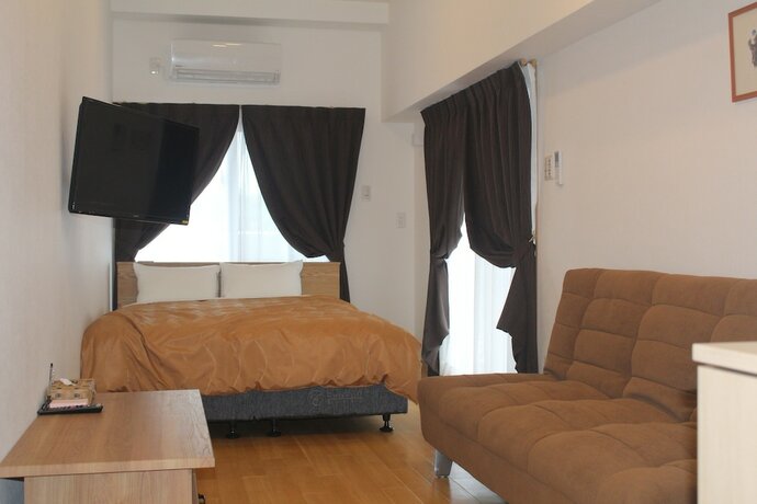 Imagen de la habitación del Hotel M's Stay Okinawa. Foto 21