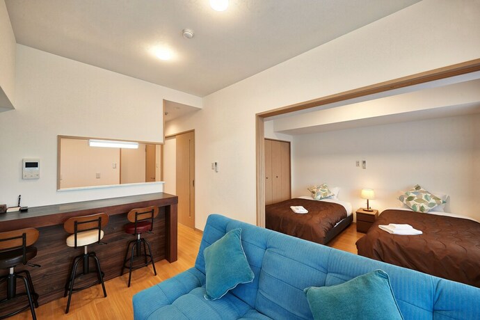 Imagen de la habitación del Hotel M's Stay Okinawa. Foto 24