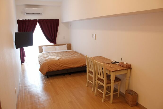 Imagen de la habitación del Hotel M's Stay Okinawa. Foto 26