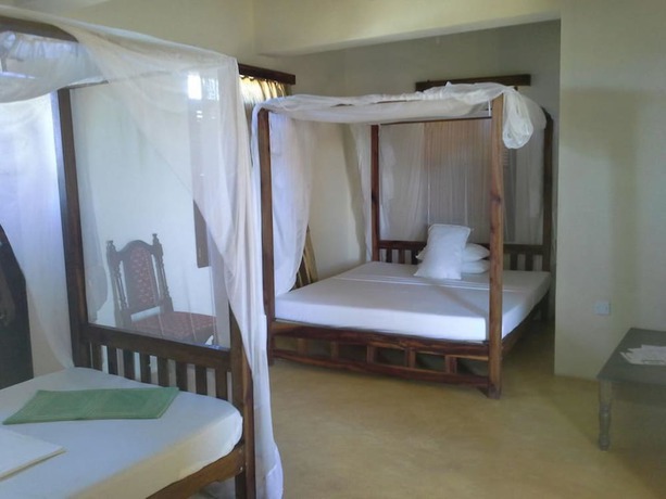 Imagen de la habitación del Hotel Msafini MangoTop Roof. Foto 7