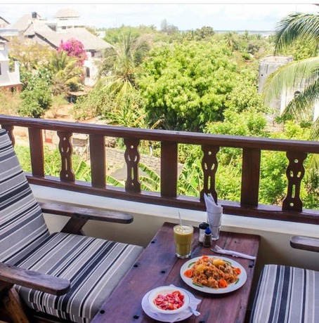 Imagen del bar/restaurante del Hotel Msafini MangoTop Roof. Foto 3