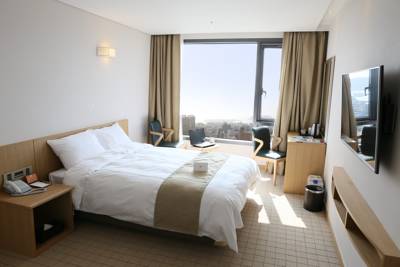 Imagen de la habitación del Hotel M-stay Jeju. Foto 6