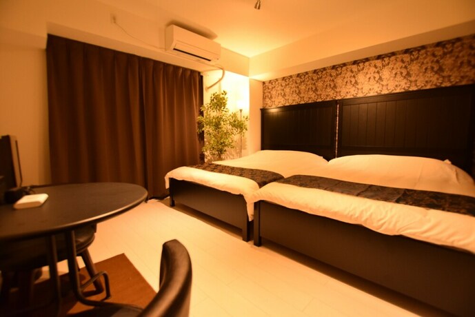 Imagen de la habitación del Hotel Mt House Bentencho. Foto 32