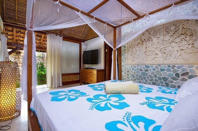 Imagen de la habitación del Hotel Mu Bungalow Boutique Resort. Foto 3