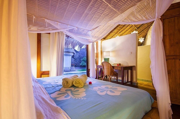 Imagen de la habitación del Hotel Mu Bungalow Boutique Resort. Foto 5