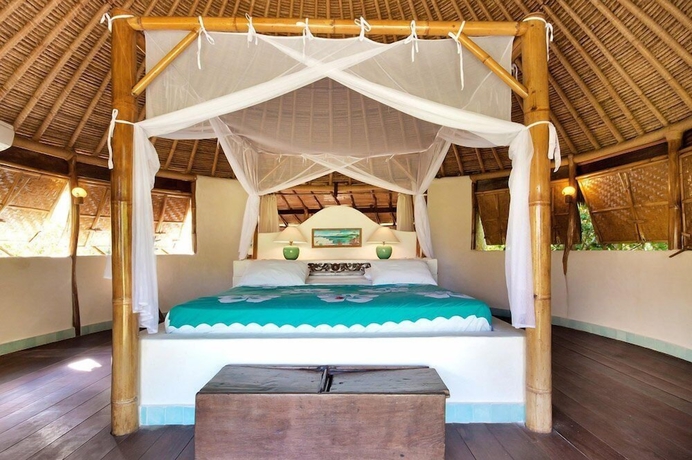 Imagen de la habitación del Hotel Mu Bungalow Boutique Resort. Foto 6