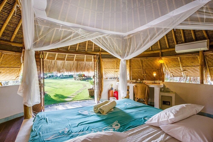 Imagen de la habitación del Hotel Mu Bungalow Boutique Resort. Foto 7