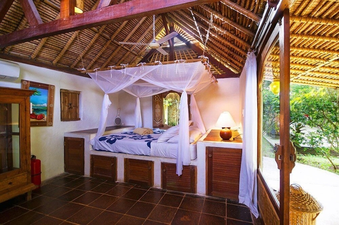 Imagen de la habitación del Hotel Mu Bungalow Boutique Resort. Foto 9