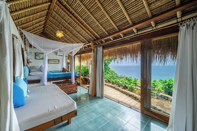 Imagen de la habitación del Hotel Mu Bungalow Boutique Resort. Foto 11