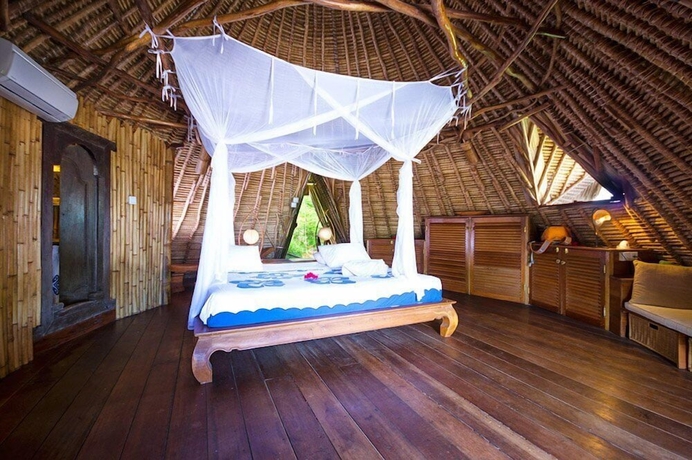 Imagen de la habitación del Hotel Mu Bungalow Boutique Resort. Foto 12
