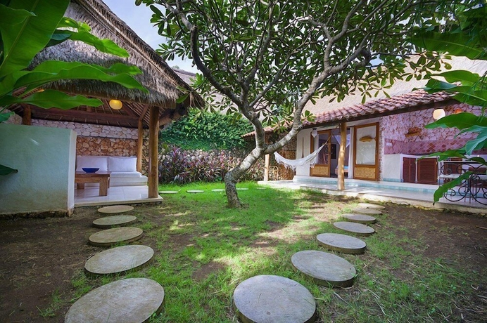 Imagen de la habitación del Hotel Mu Bungalow Boutique Resort. Foto 13