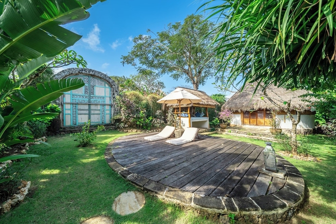 Imagen de la habitación del Hotel Mu Bungalow Boutique Resort. Foto 15