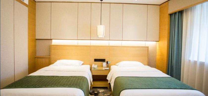 Imagen de la habitación del Hotel Mu Dan Jiang Oriental Pearl International Hotel. Foto 7