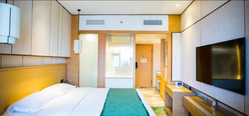 Imagen de la habitación del Hotel Mu Dan Jiang Oriental Pearl International Hotel. Foto 10