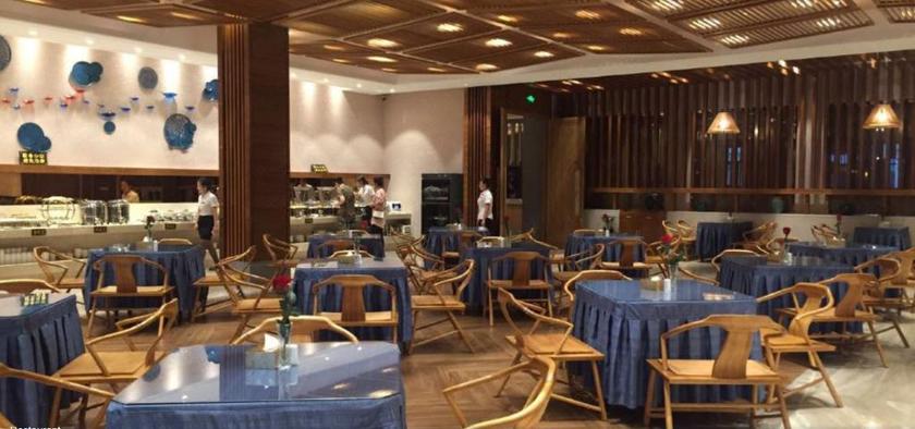 Imagen del bar/restaurante del Hotel Mu Dan Jiang Oriental Pearl International Hotel. Foto 3