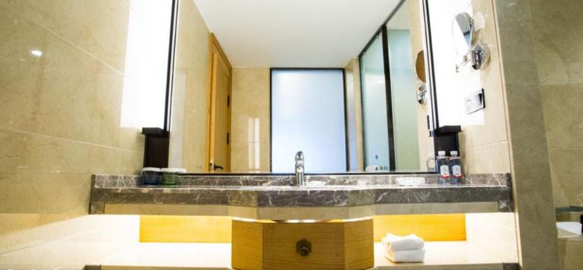 Imagen de la habitación del Hotel Mu Dan Jiang Oriental Pearl International Hotel. Foto 12