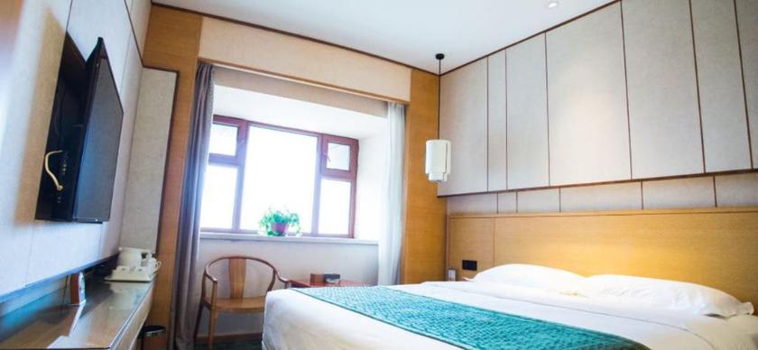 Imagen de la habitación del Hotel Mu Dan Jiang Oriental Pearl International Hotel. Foto 13