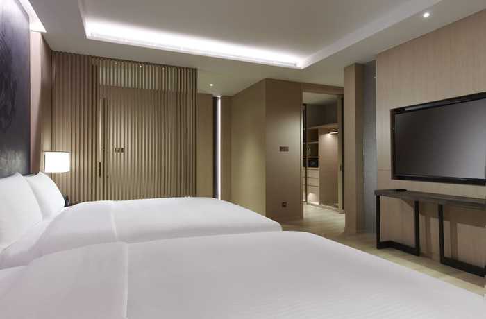 Imagen de la habitación del Hotel Mu Jiao Xi. Foto 7