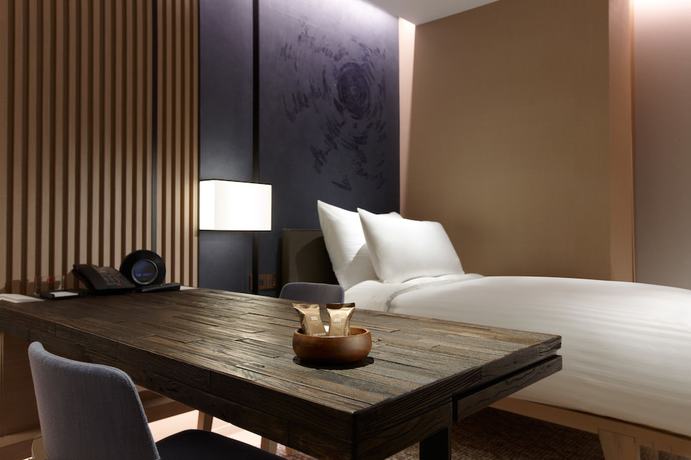 Imagen de la habitación del Hotel Mu Jiao Xi. Foto 8