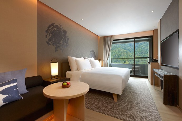 Imagen de la habitación del Hotel Mu Jiao Xi. Foto 9