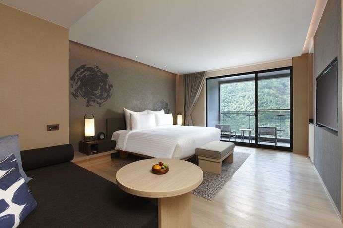 Imagen de la habitación del Hotel Mu Jiao Xi. Foto 11