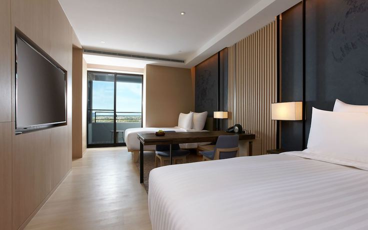 Imagen de la habitación del Hotel Mu Jiao Xi. Foto 12