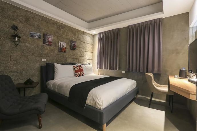 Imagen de la habitación del Hotel Mu Ku Hotel. Foto 17