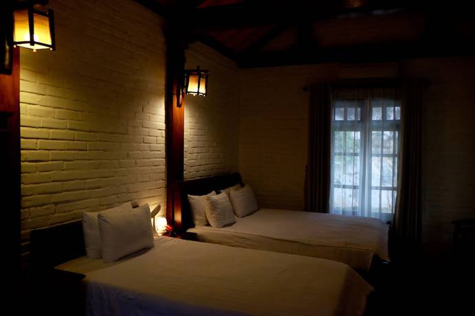 Imagen de la habitación del Hotel Mua Caves Ecolodge. Foto 2