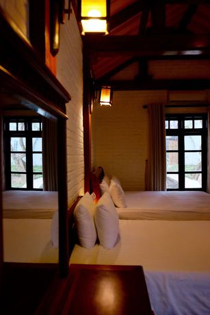 Imagen de la habitación del Hotel Mua Caves Ecolodge. Foto 3