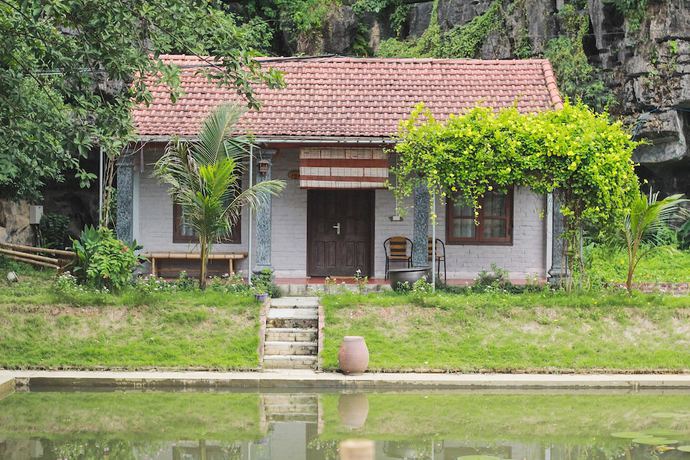 Imagen de la habitación del Hotel Mua Caves Ecolodge. Foto 6